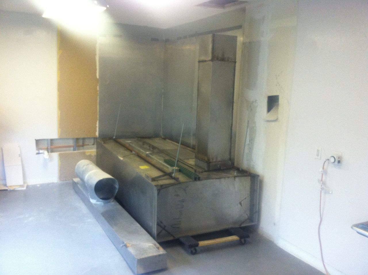 The exhaust hood provided by our landlord about to go up...