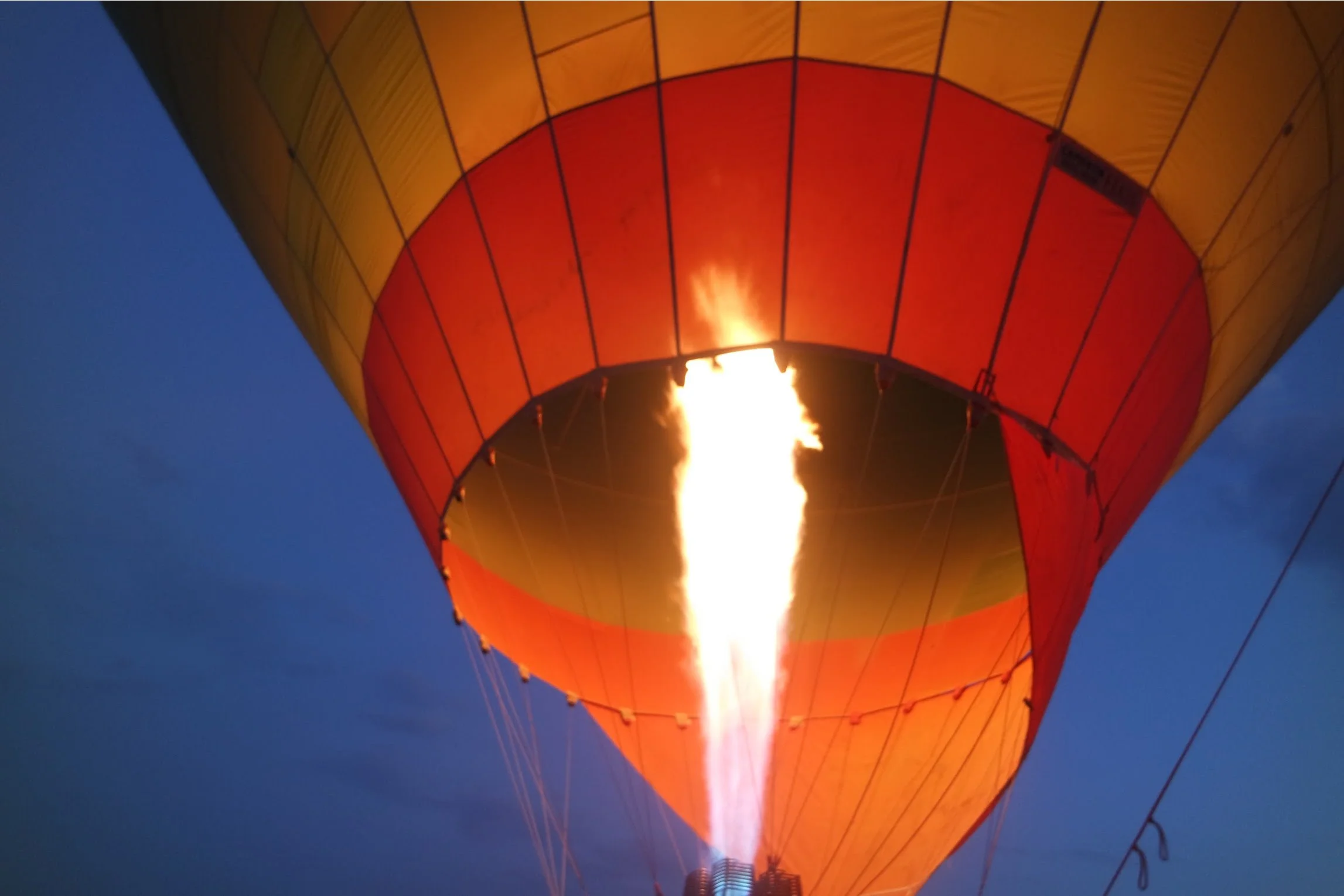 An image of a red and orange hot air balloon.