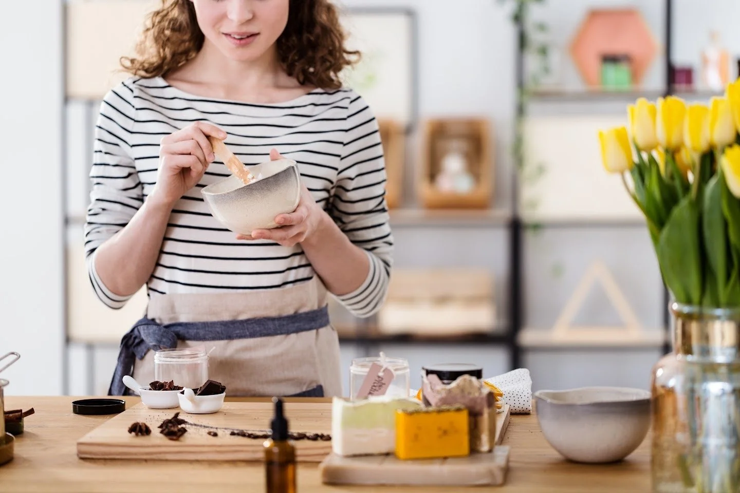 A child making soap for Waldorf seventh grade chemistry curriculum.