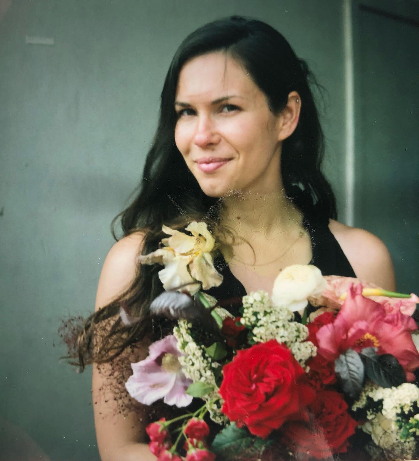 A gal and her flowers, taken on a &lsquo;48 Polaroid by @hikylewhite.