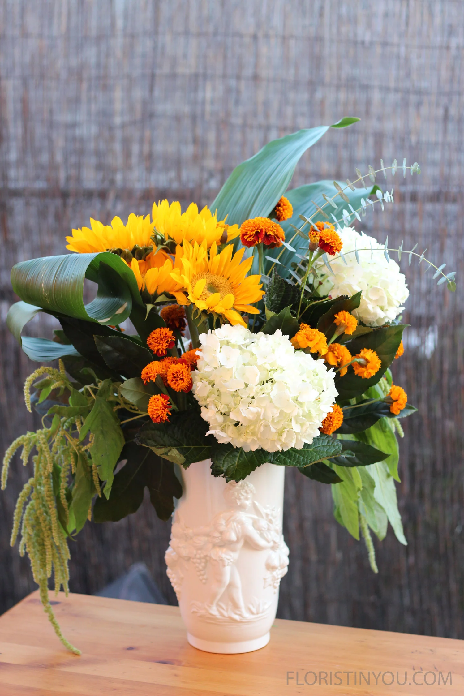Sunflowers and Hydrangeas
Normal
0
false
false
false
EN-US
JA
X-NONE
/* Style Definitions */
table.MsoNormalTable
{mso-style-name:"Table Normal";
mso-tstyle-rowband-size:0;
mso-tstyle-colband-size:0;
mso-style-noshow:yes;
mso-style-priority:99;
mso-style-parent:"";
mso-padding-alt:0in 5.4pt 0in 5.4pt;
mso-para-margin:0in;
mso-para-margin-bottom:.0001pt;
mso-pagination:widow-orphan;
font-size:12.0pt;
font-family:Cambria;
mso-ascii-font-family:Cambria;
mso-ascii-theme-font:minor-latin;
mso-hansi-font-family:Cambria;
mso-hansi-theme-font:minor-latin;}
