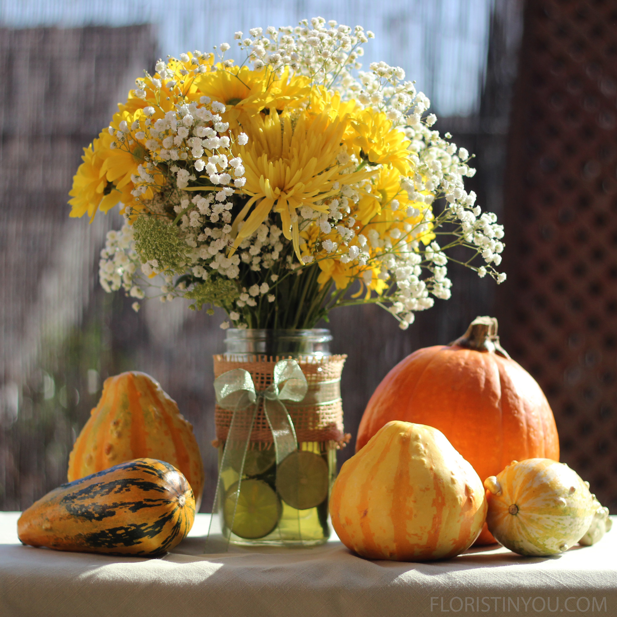 Fresh Limes, Spider Mums and Daisies