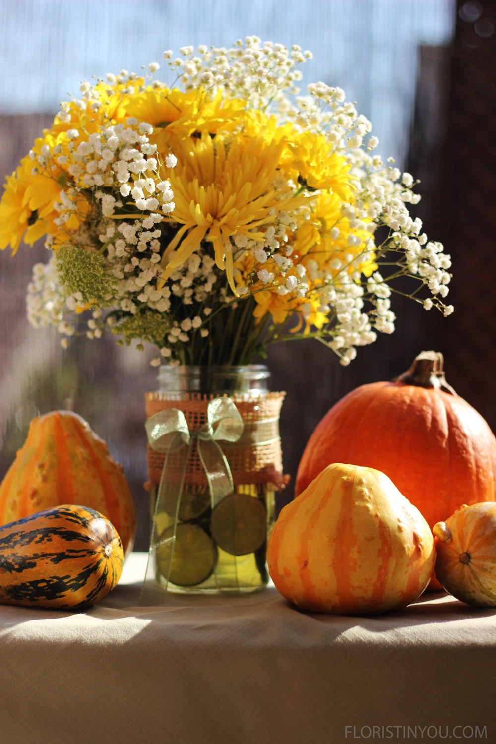 Fresh Limes, Spider Mums and Daisies