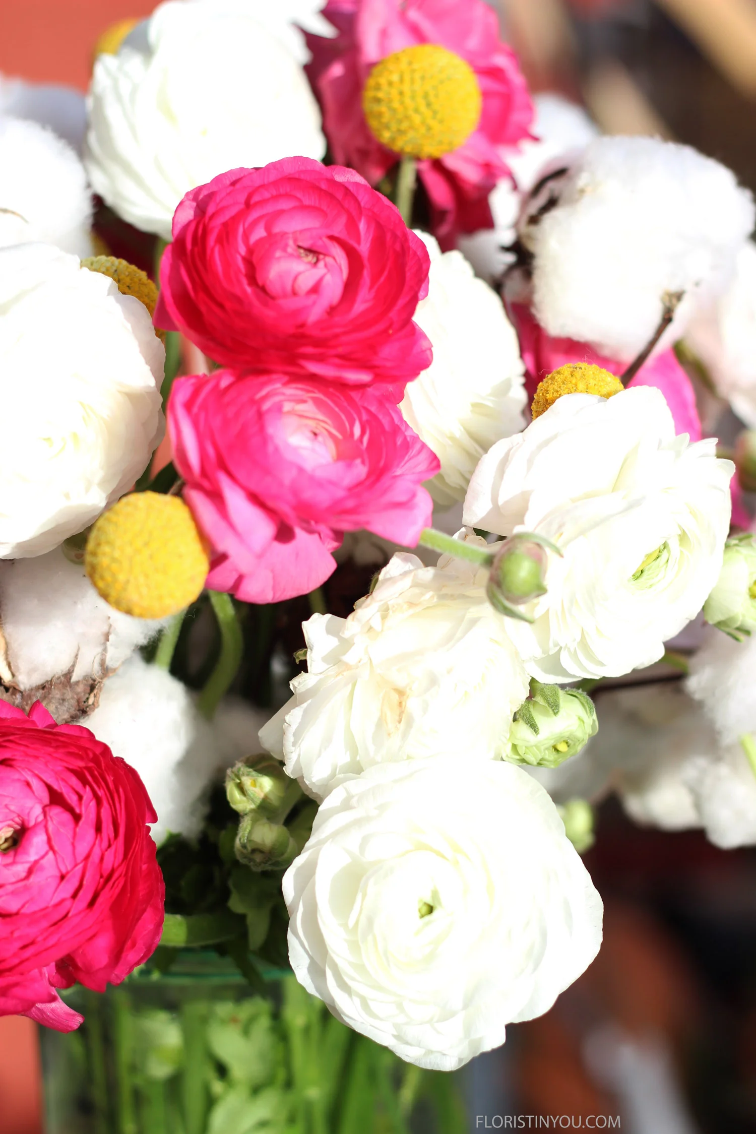 Add the buds with the Ranunculus.  They have a wonderful look all their own.