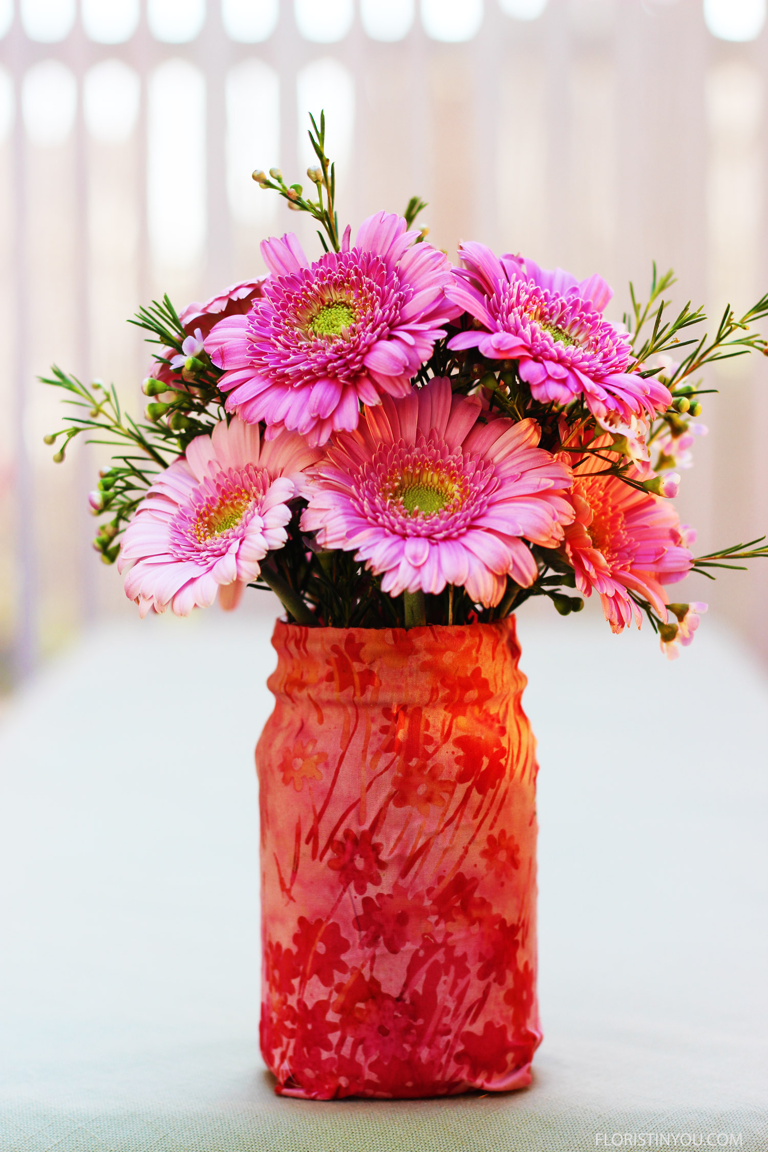 Gerber Daisies and Wax Flowers