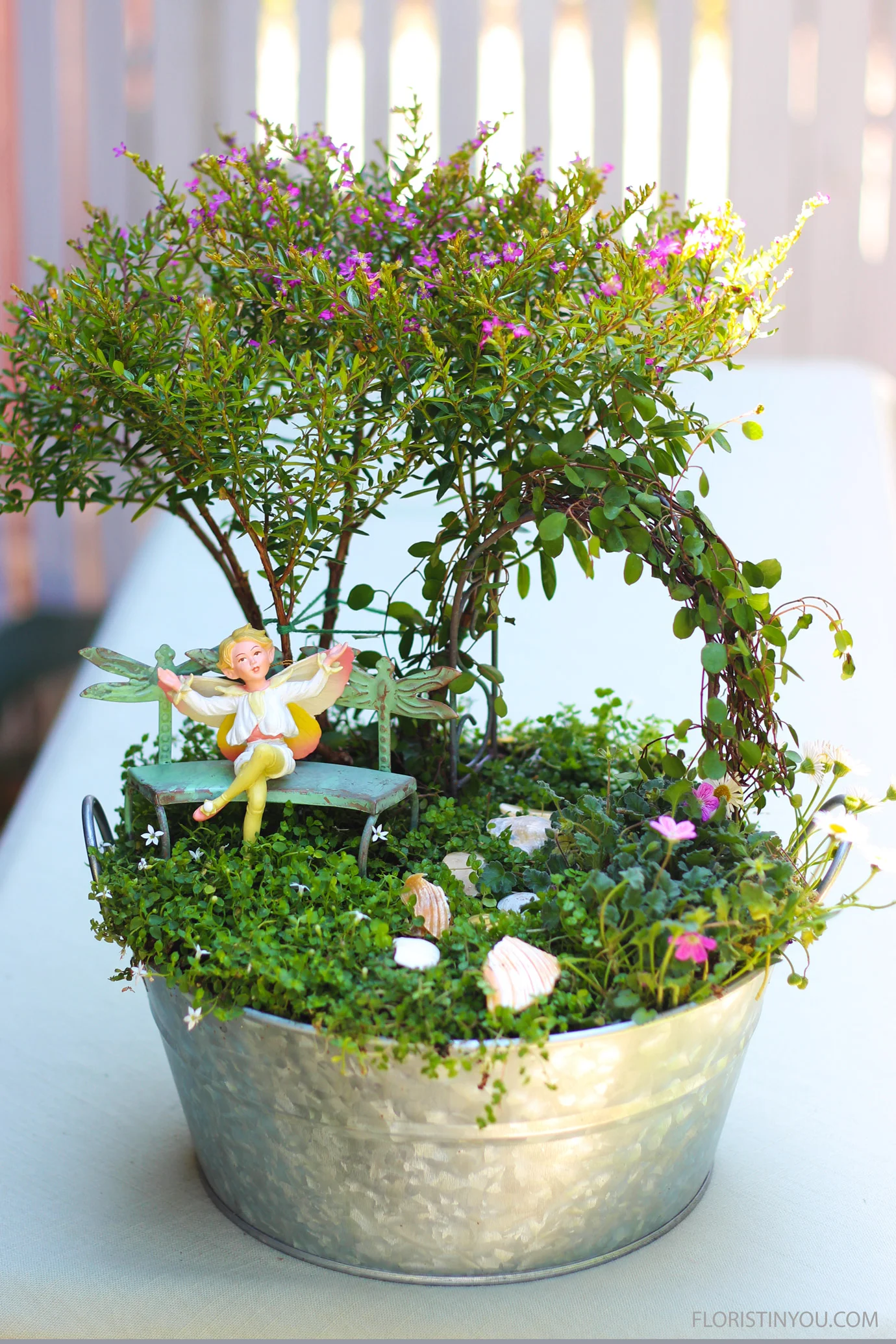 How to Make a Fairy Garden
Normal
0
false
false
false
EN-US
JA
X-NONE
/* Style Definitions */
table.MsoNormalTable
{mso-style-name:"Table Normal";
mso-tstyle-rowband-size:0;
mso-tstyle-colband-size:0;
mso-style-noshow:yes;
mso-style-priority:99;
mso-style-parent:"";
mso-padding-alt:0in 5.4pt 0in 5.4pt;
mso-para-margin:0in;
mso-para-margin-bottom:.0001pt;
mso-pagination:widow-orphan;
font-size:12.0pt;
font-family:Cambria;
mso-ascii-font-family:Cambria;
mso-ascii-theme-font:minor-latin;
mso-hansi-font-family:Cambria;
mso-hansi-theme-font:minor-latin;}