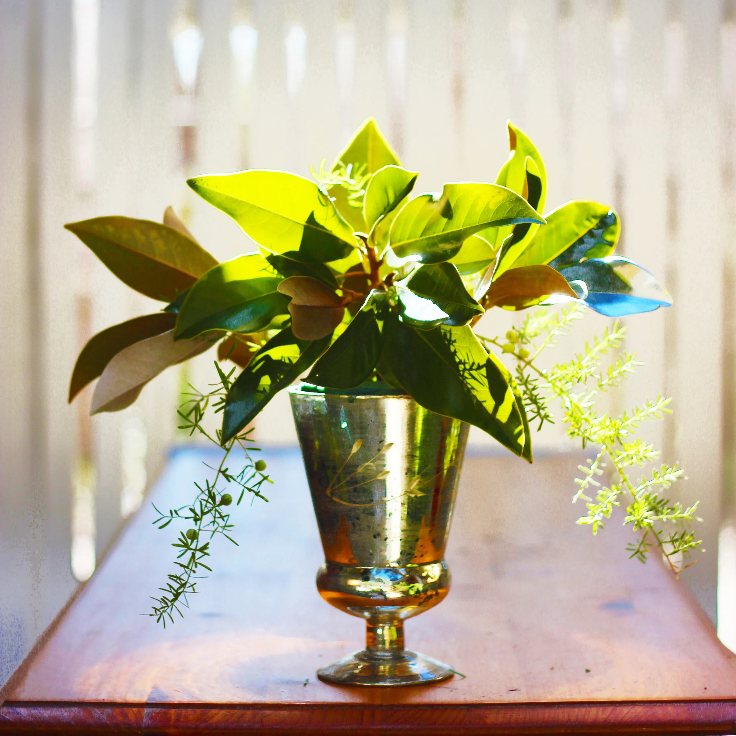 Insert on side and have it cross over and go down opposite side.  Repeat on other side.