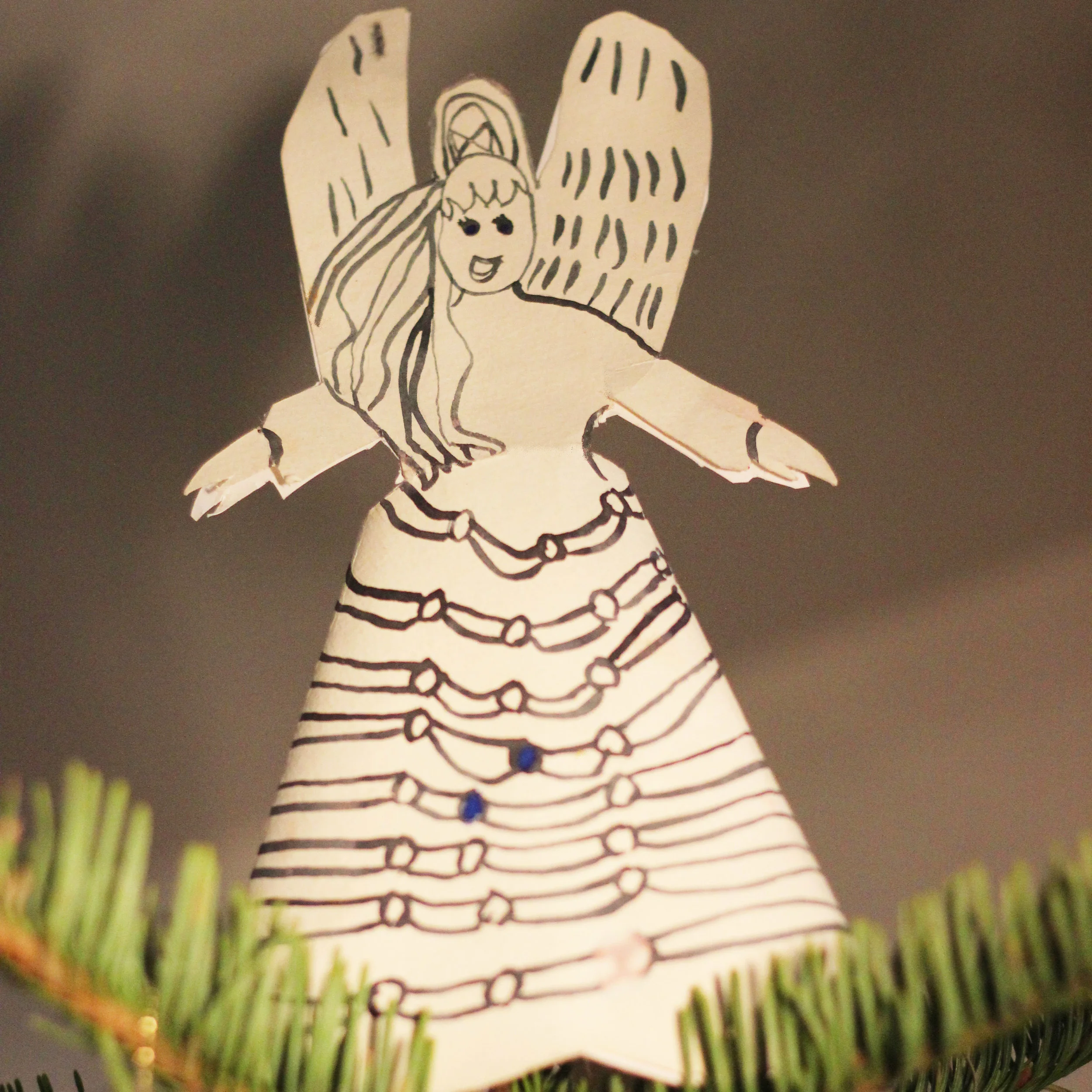 Have your kids paint a watercolor angel topper and ornaments.
