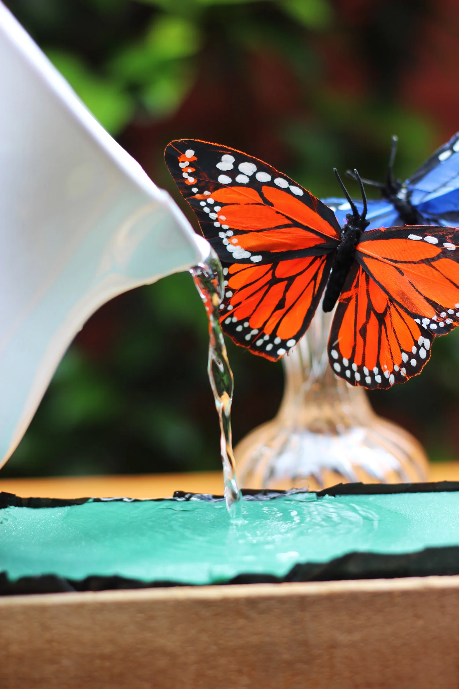 Put floral fresh in water.  Pour into foam until it won't hold any more.