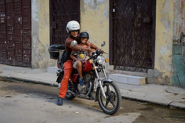In search of adventure, this father son team are headed out of Centro Habana on their motorcycle. #cubanlife #goinghome #streetphotography #motorcycle #cuba #habana #centrohabana