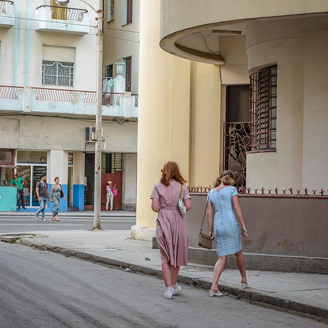 Vintage visitors headed out in Havana. #cubanlife #vintageclothing #architecture #centrohabana #streetphotography #havana  #goinghome #cuba #apair #lost
