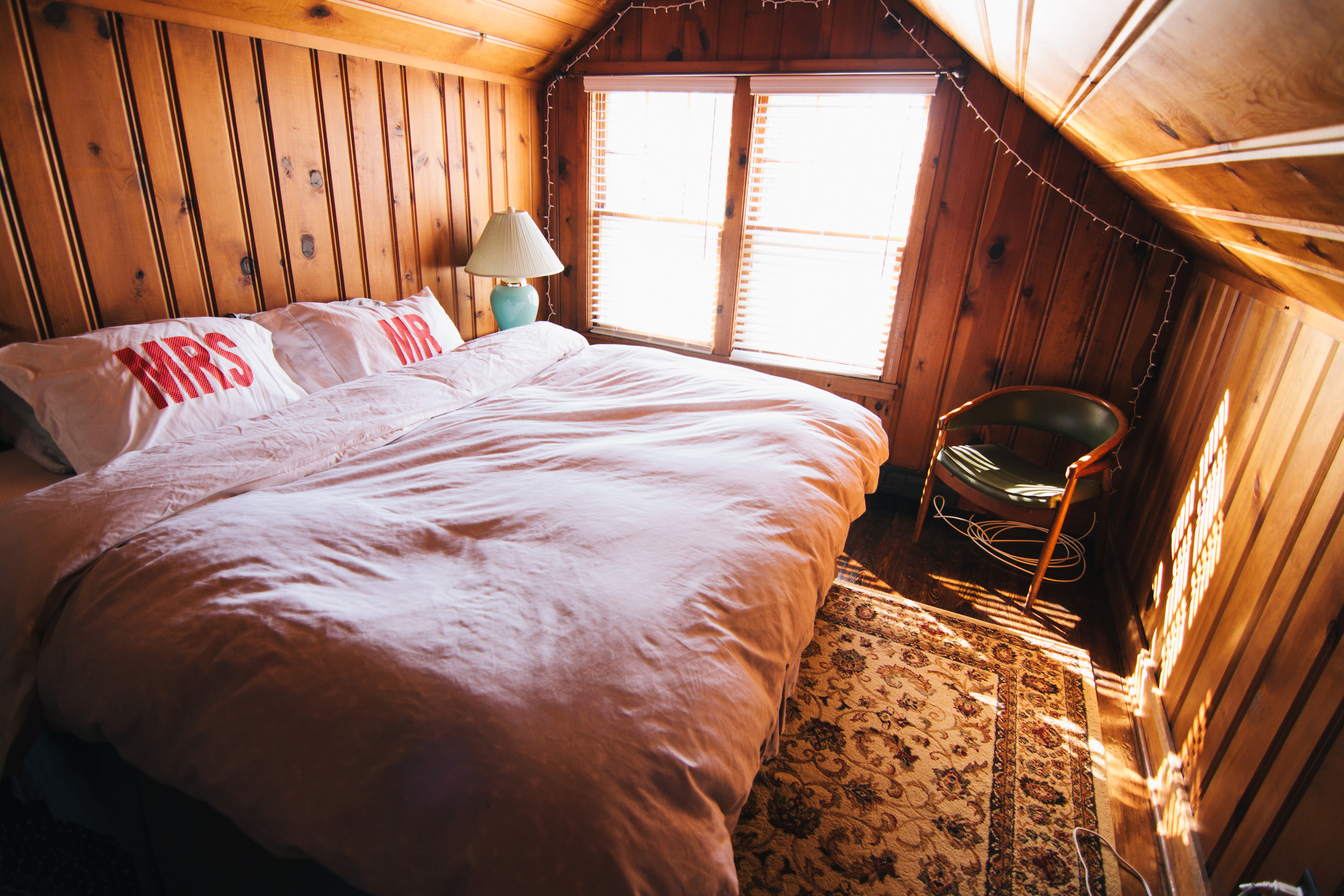  I love the cabin-feel to our master bedroom. &nbsp;Even though in the winter it gets freezing cold up there and in the summer it gets sauna-hot. &nbsp;PTL for window AC's. 