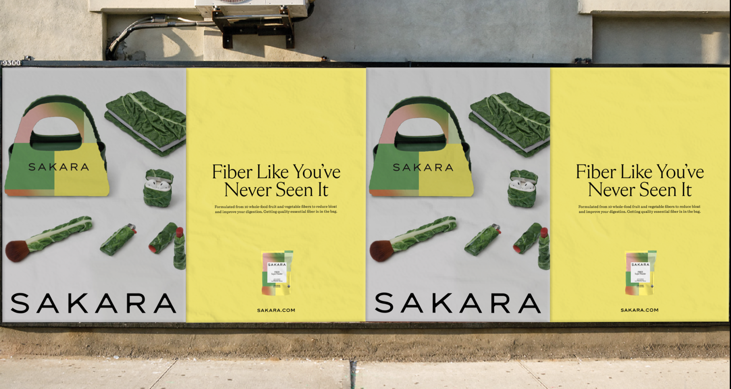 Billboard advertisement for Sakara featuring a yellow background, green and beige tote bag with Sakara logo, healthy food items, and text promoting fiber and digestive health, with the Sakara website at the bottom.