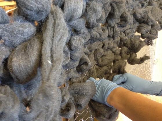  weaving steel wool. Interns earning school cedit have helped along the way. This "wool" will rust and change over the seasons. 