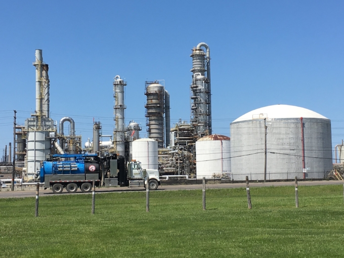 Looking north at chemical plants and refineries from Aamjiwnaang First Nations Community (Sarnia) near Lake Ontario, while on a Toxic Tour led by Beze and Vanessa Gray