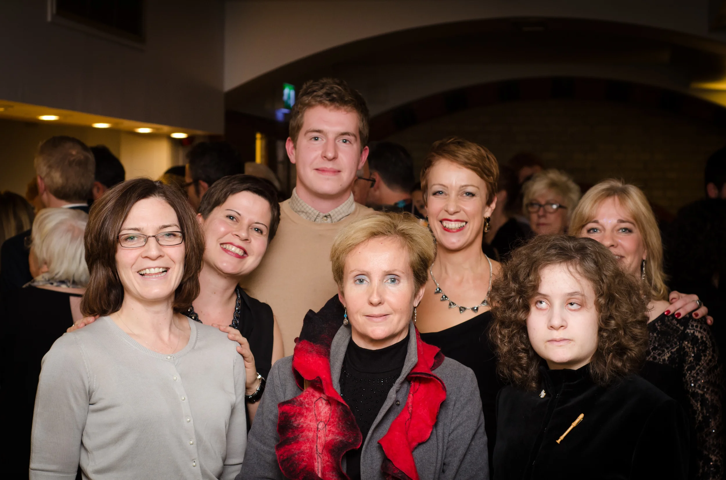 Alexia Sloane with her mother Isabelle and members of the Dosoco team at The Dowsing Sound Collective Christmas gig, during which Dosoco's awards were announced.
