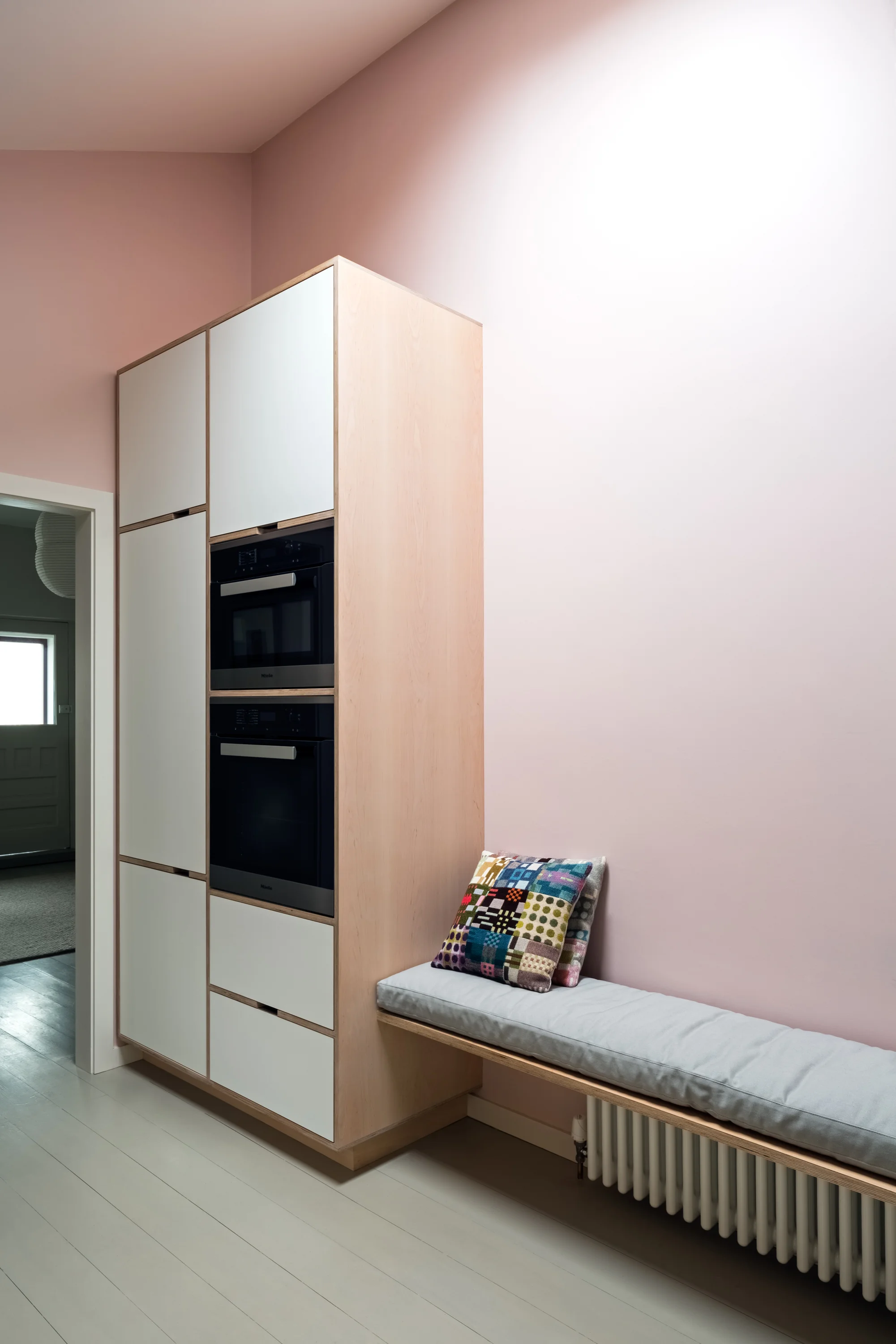 Plywood kitchen and bench by Uncommon Projects