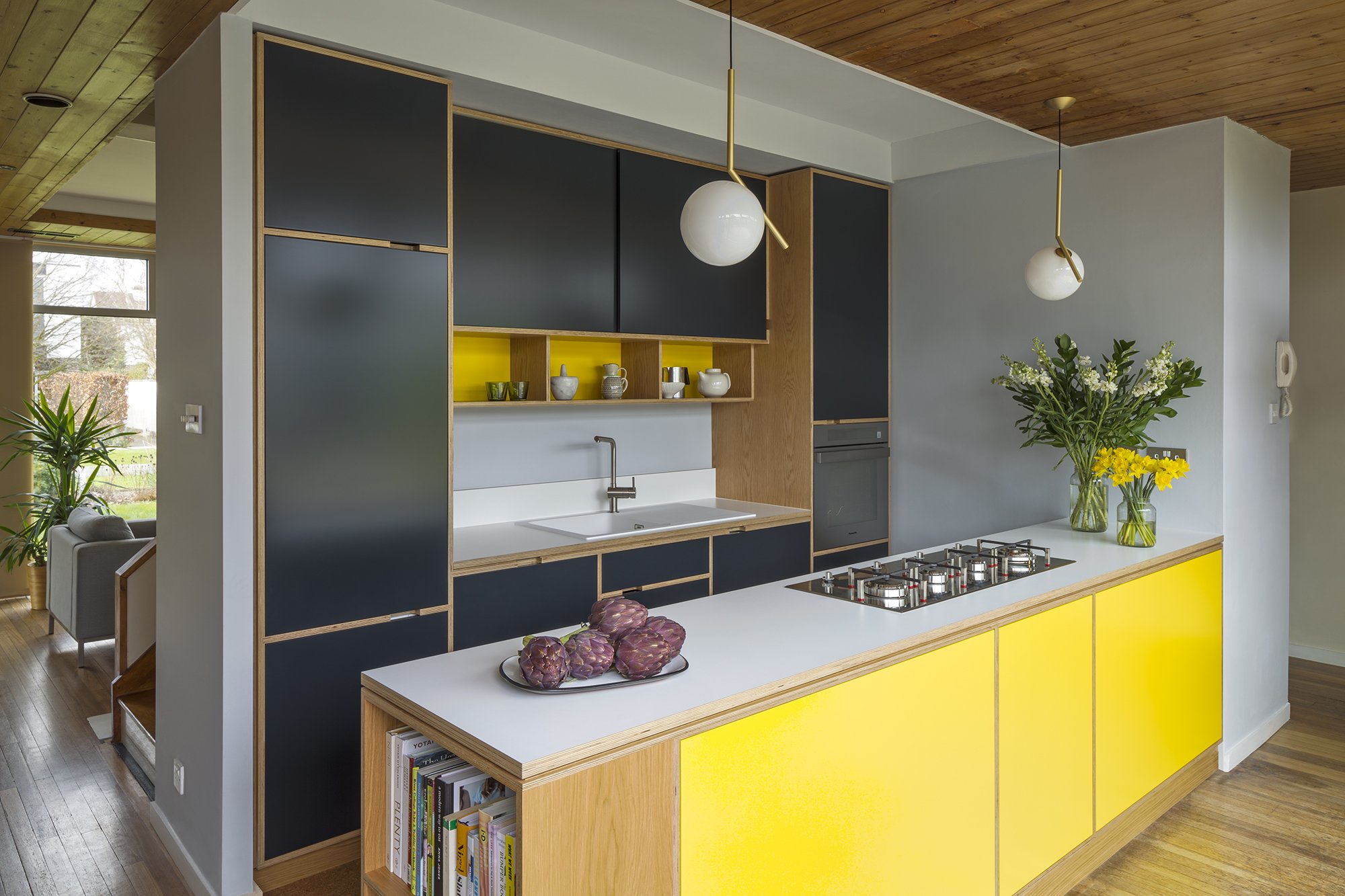Shepperton+Bespoke+Plywood+Kitchen+In+Birch+With+Wooden+Flooring+And+Canary+Yellow+Ply+Cabinetry