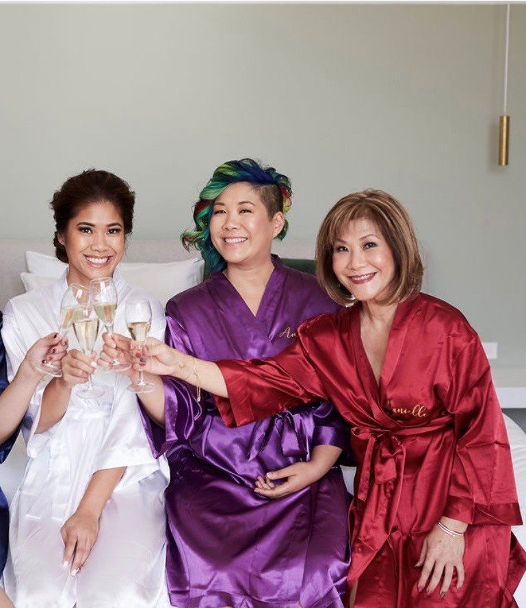 A beautiful bride with her Mum and sister 