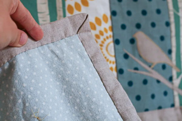 Linen cot quilt with a flannelette back.