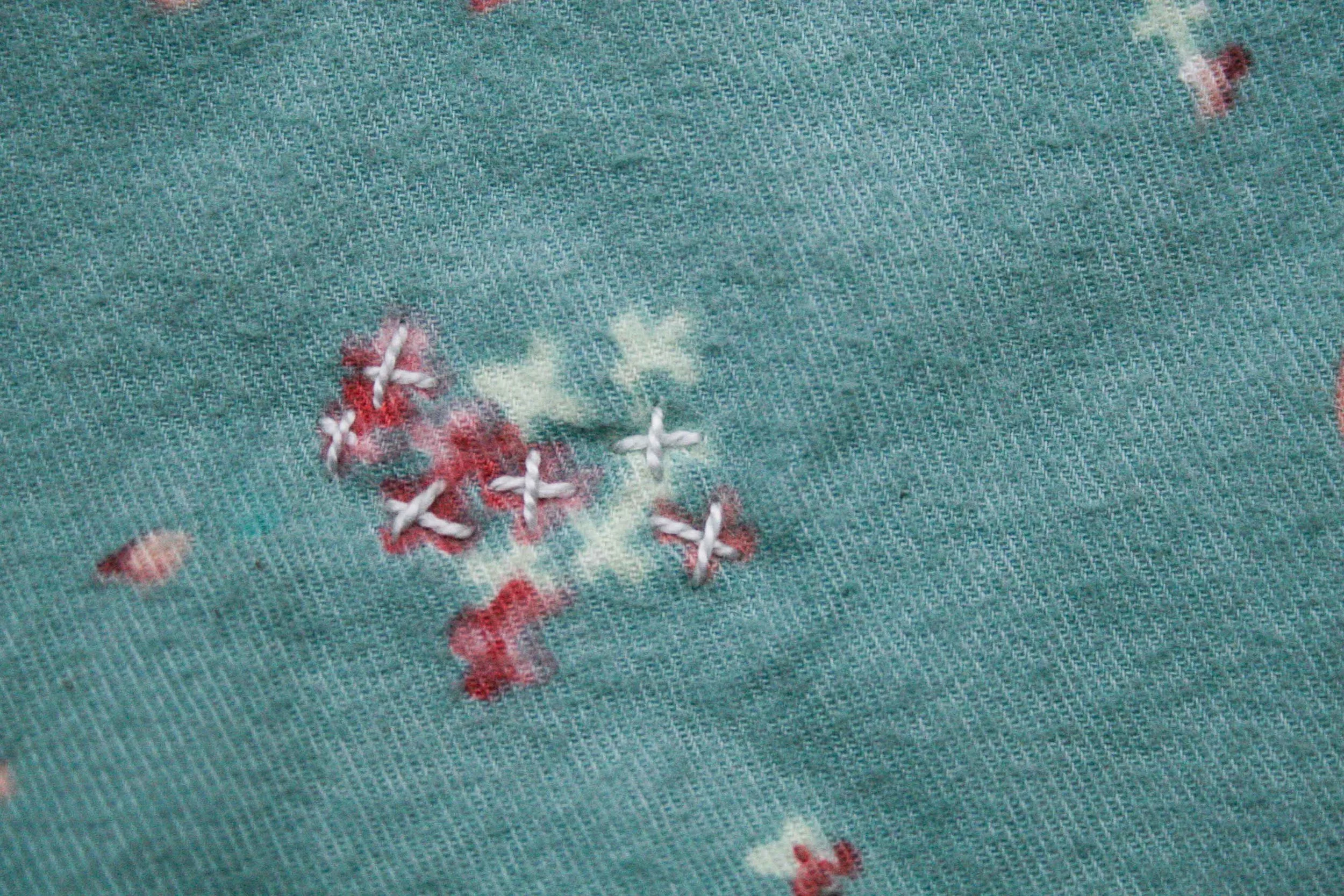 Handquilting on a whole cloth quilt