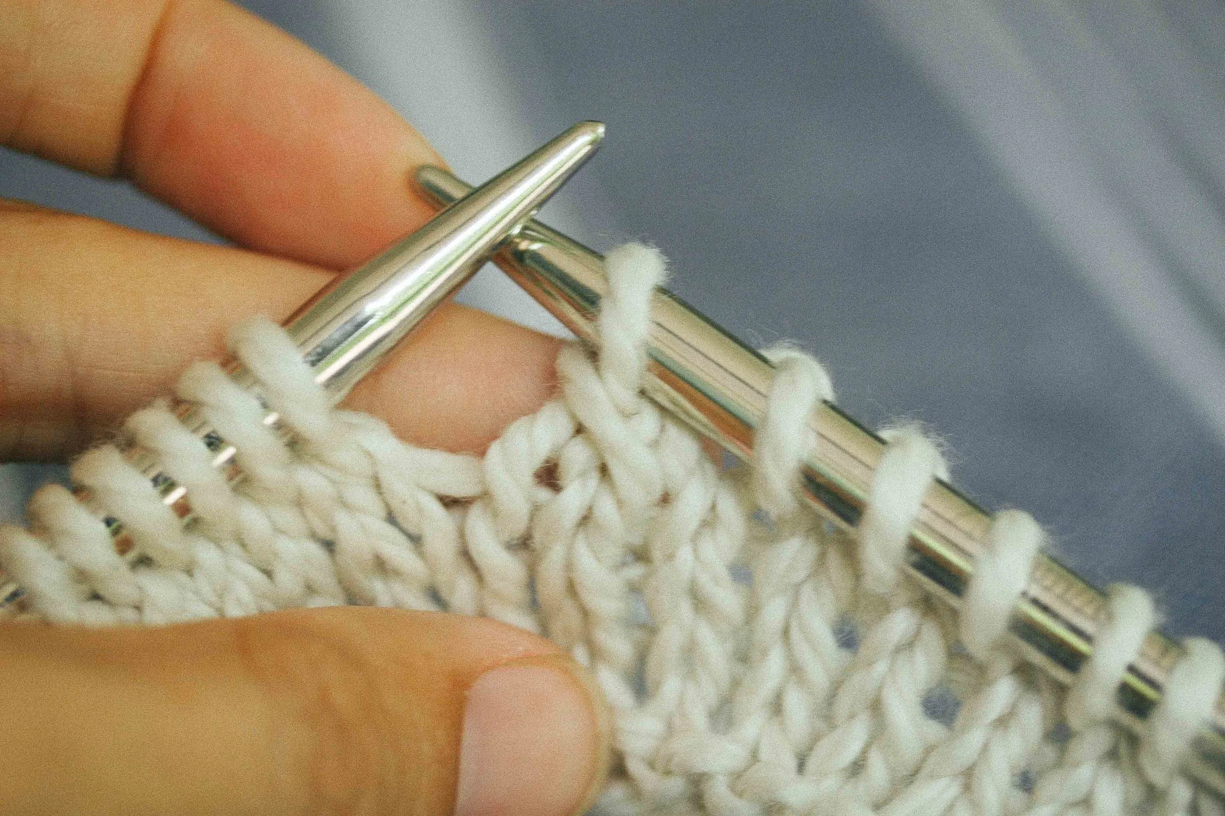 The first stitch is now sitting on top of the second stitch.