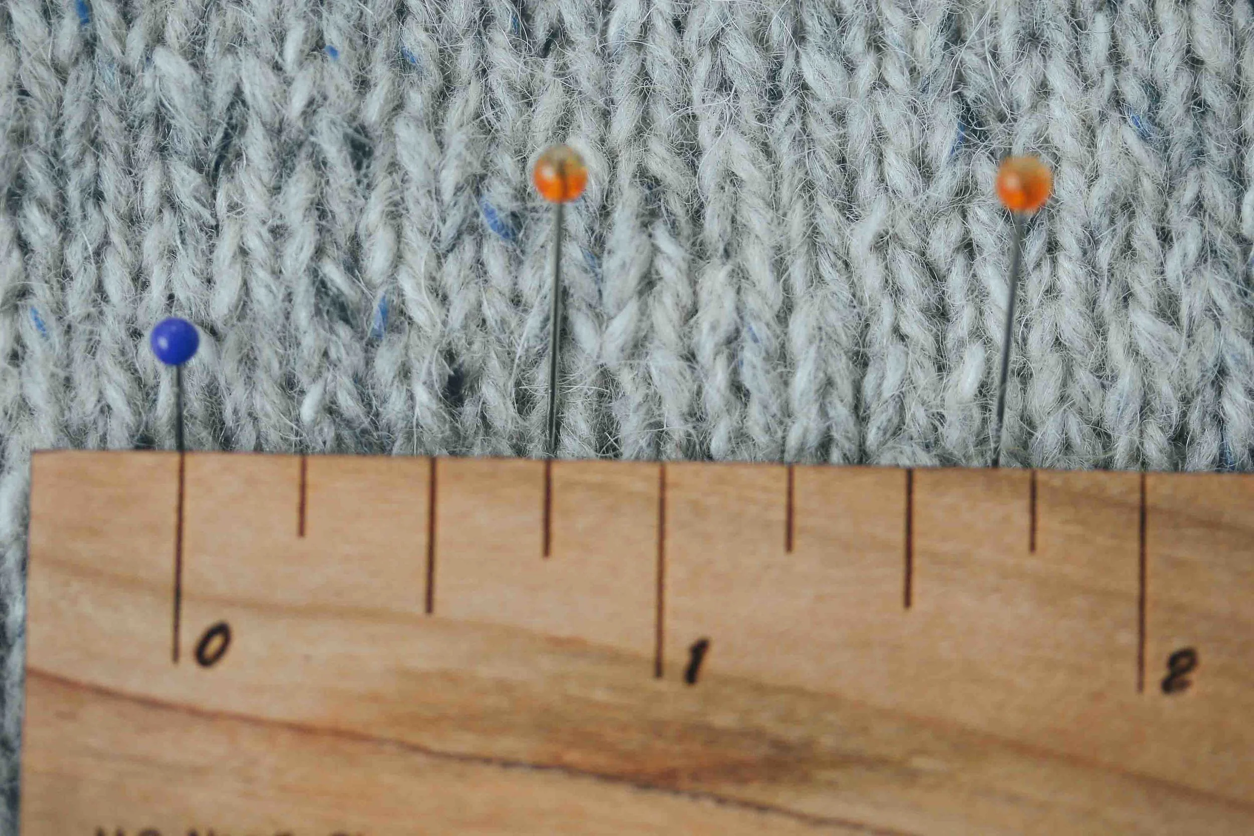 I find it easier to use a different colour pin to mark each 5 stitches. Look for the Vs.
