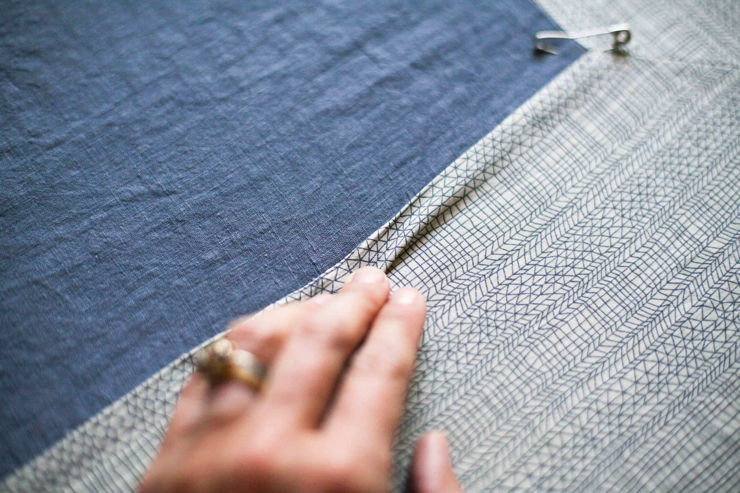 I totally fudged one side of the centre by ironing it when we were basting and hand sewed this extra flap down. You can see why in the photo at the top of the post on the right hand side of the main square. None of it is square.