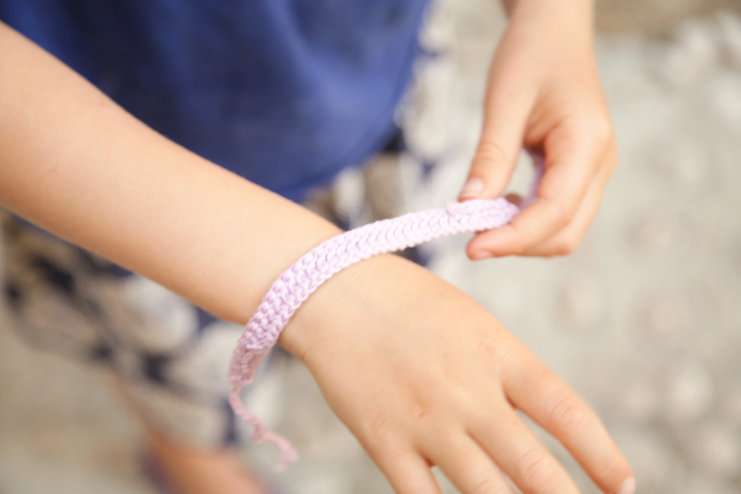 The lady we saw from the wall gave the girls bracelets.