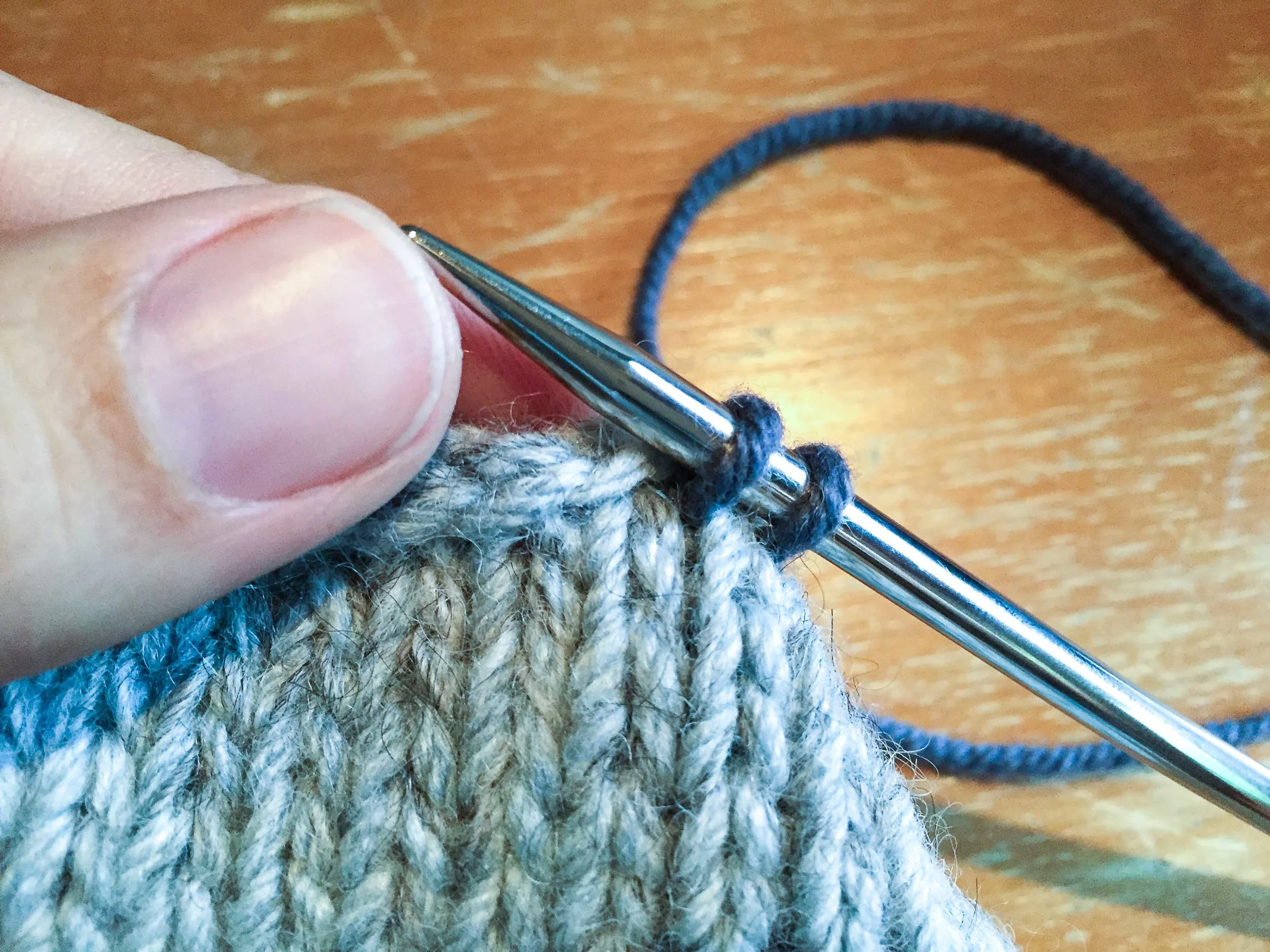 I roll back the cast on edge a little with my thumb to make sure my needle tip can easily slide into the hole of the next V.