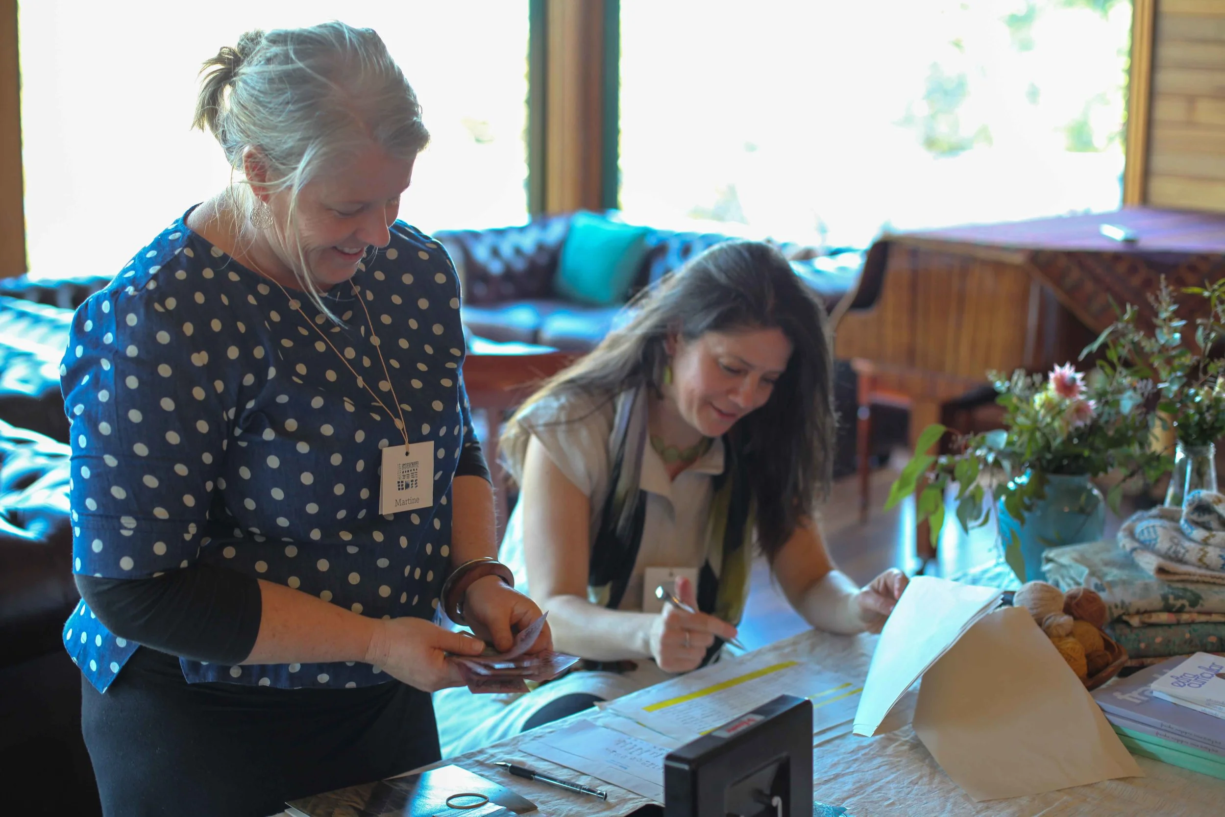 Registration with Martine and Jenn.