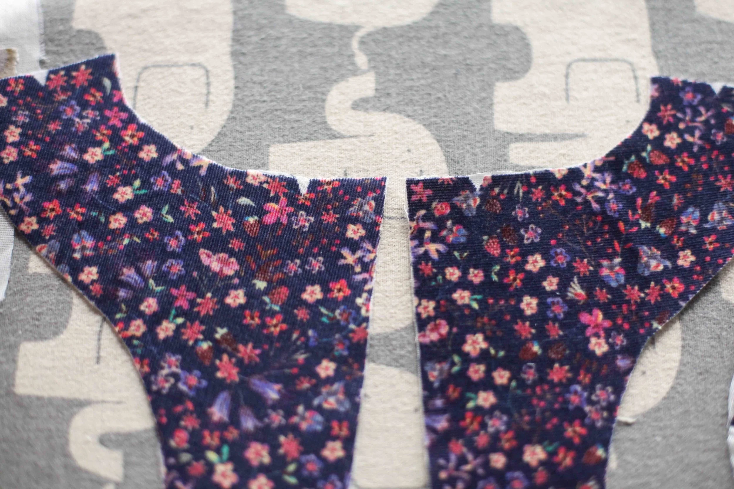 The piece on the left has been cut on a slight bias. The piece on the right has been cut on the cross grain even though it is cord and this is very wrong. Sometimes you have to do what you have to do. Stash Less means my ironing board cover is now elephants :).