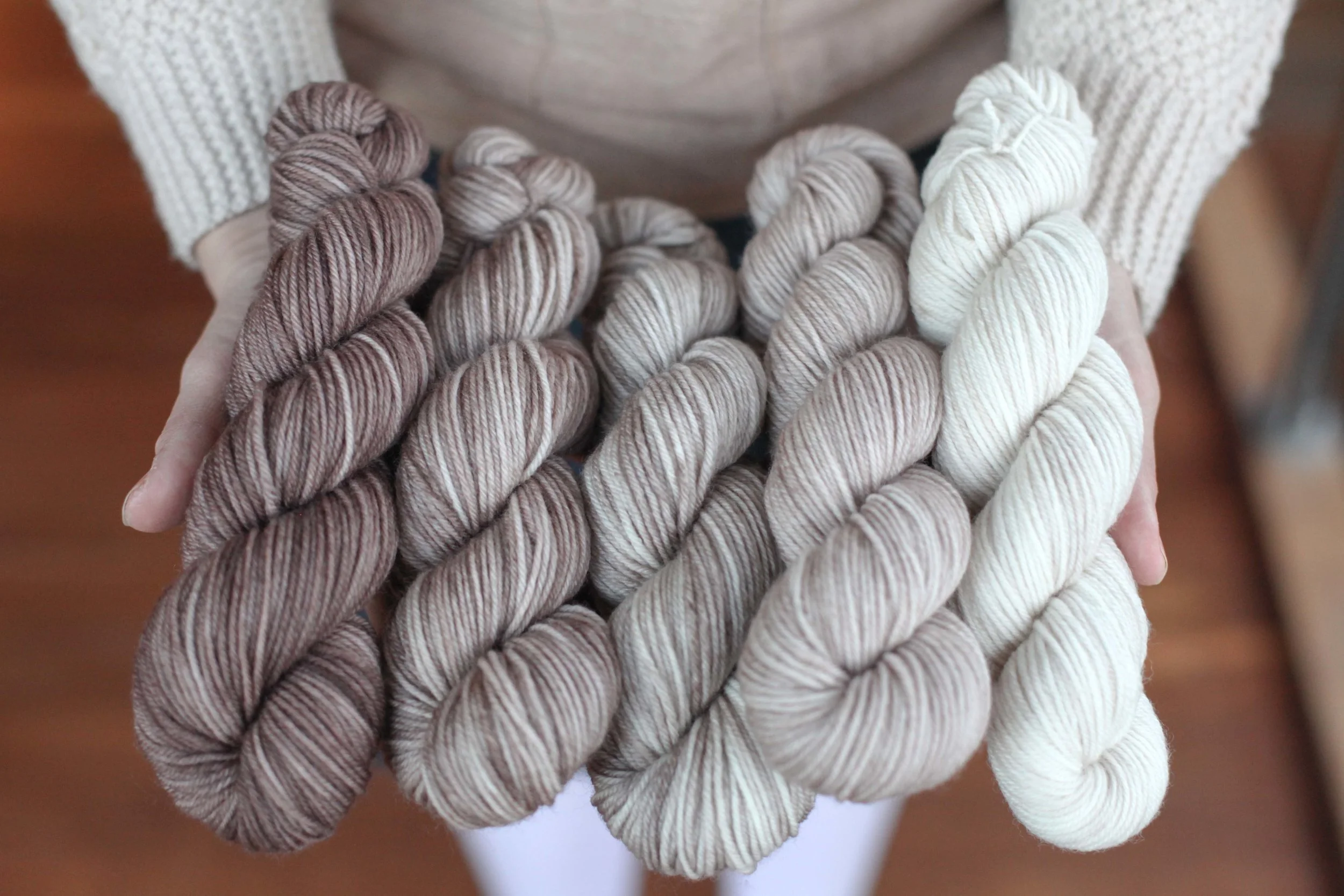 Elizabeth holding her yarn haul from Circus Tonic Handmade at our mini-market.