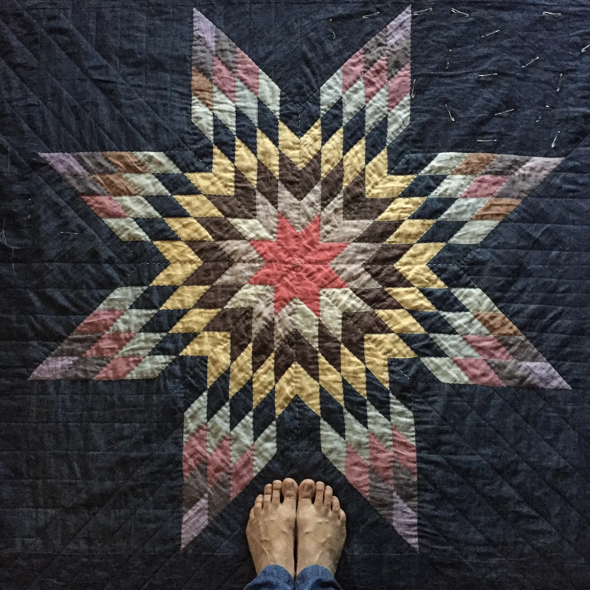 A photo of her quilt.