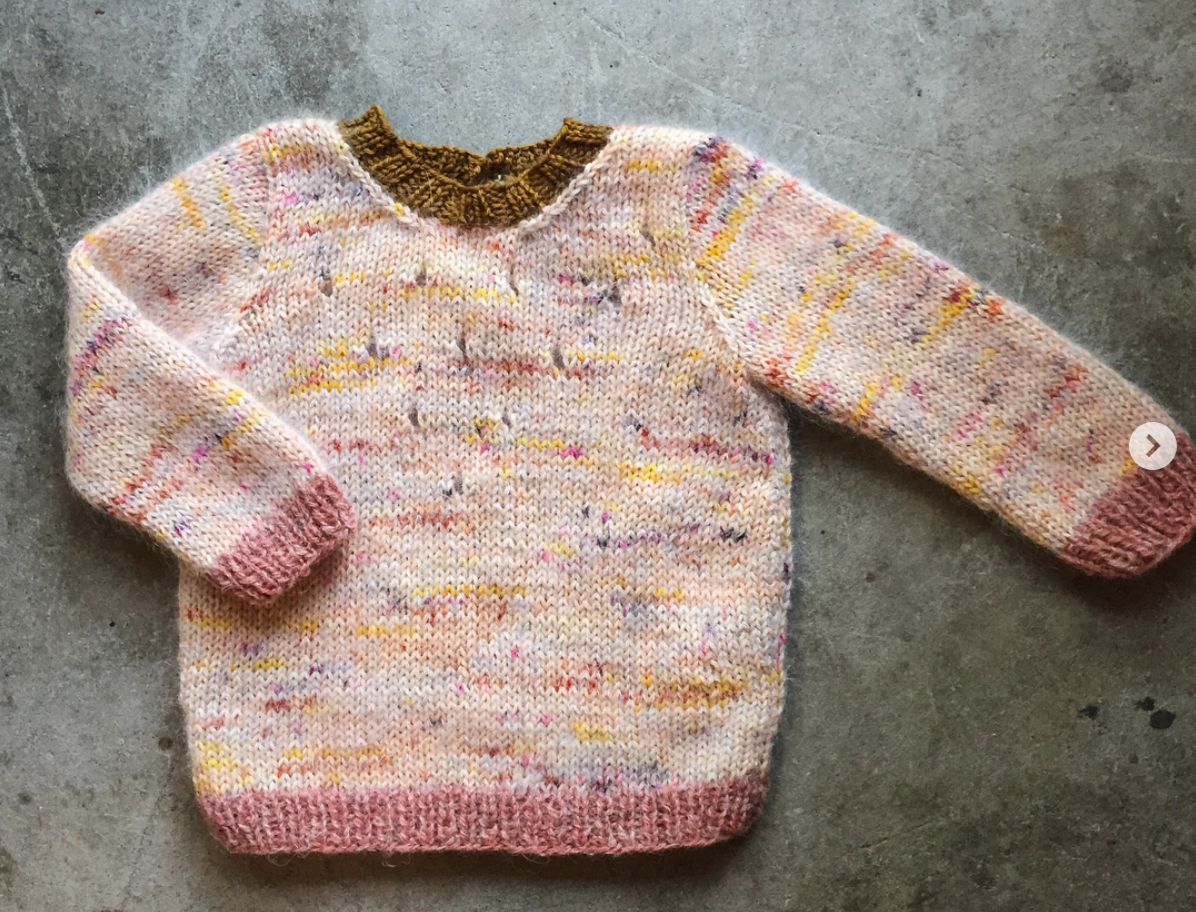 This sweater was made with one strand of scrap mohair and one strand of sock yarn. It pulled the yarn colours together and altered the weight of the yarn which made it perfect for this sweet Iris Sweater by Wiksten Made .