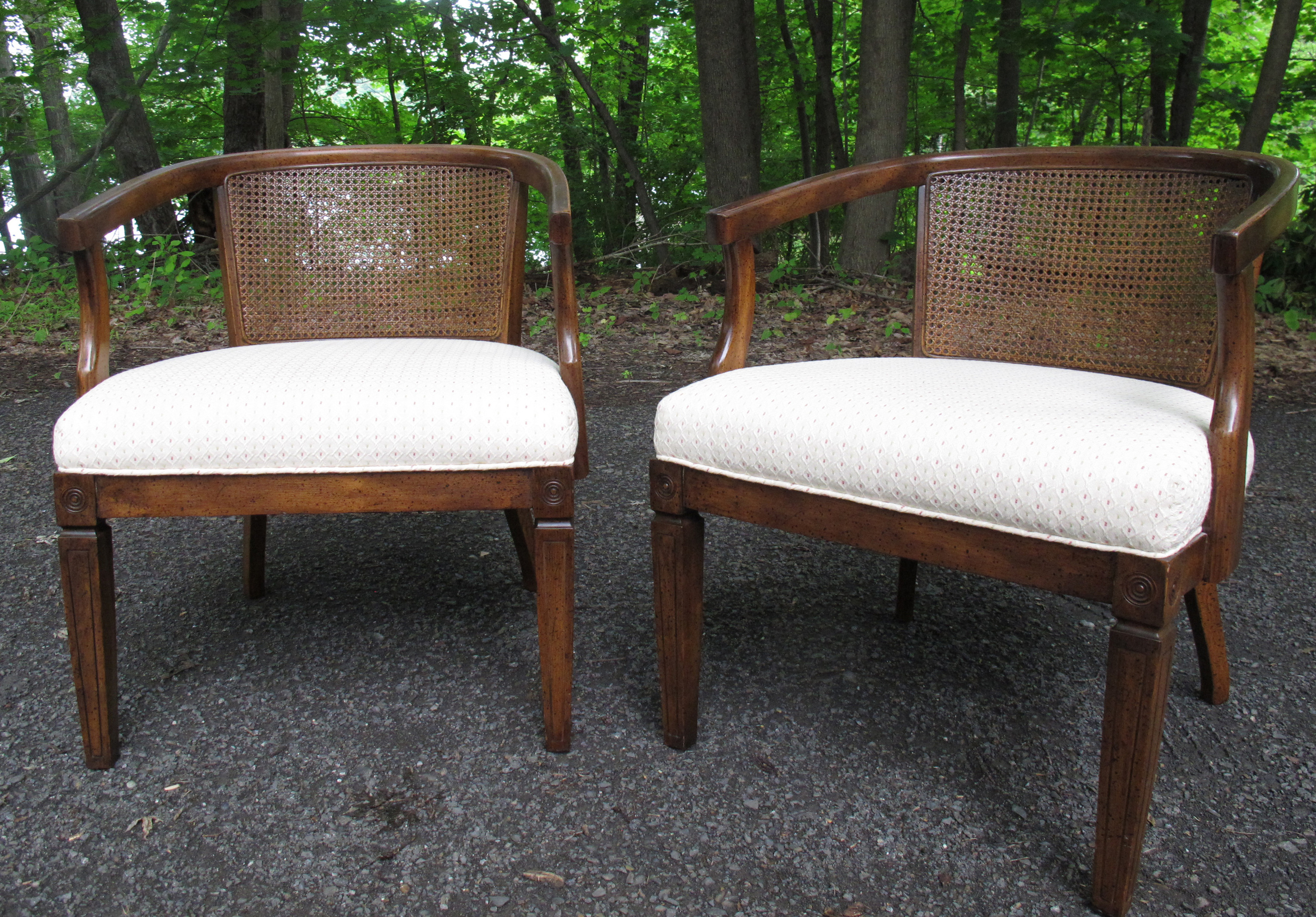 PAIR OF CANE BACK ARMCHAIRS AFTER DUNBAR