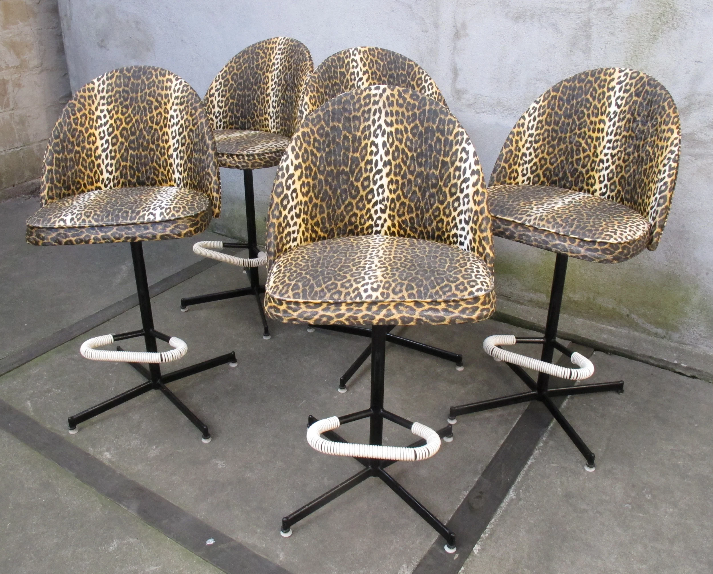 SET OF MID CENTURY ATOMIC LEOPARD SKIN SWIVEL BAR STOOLS