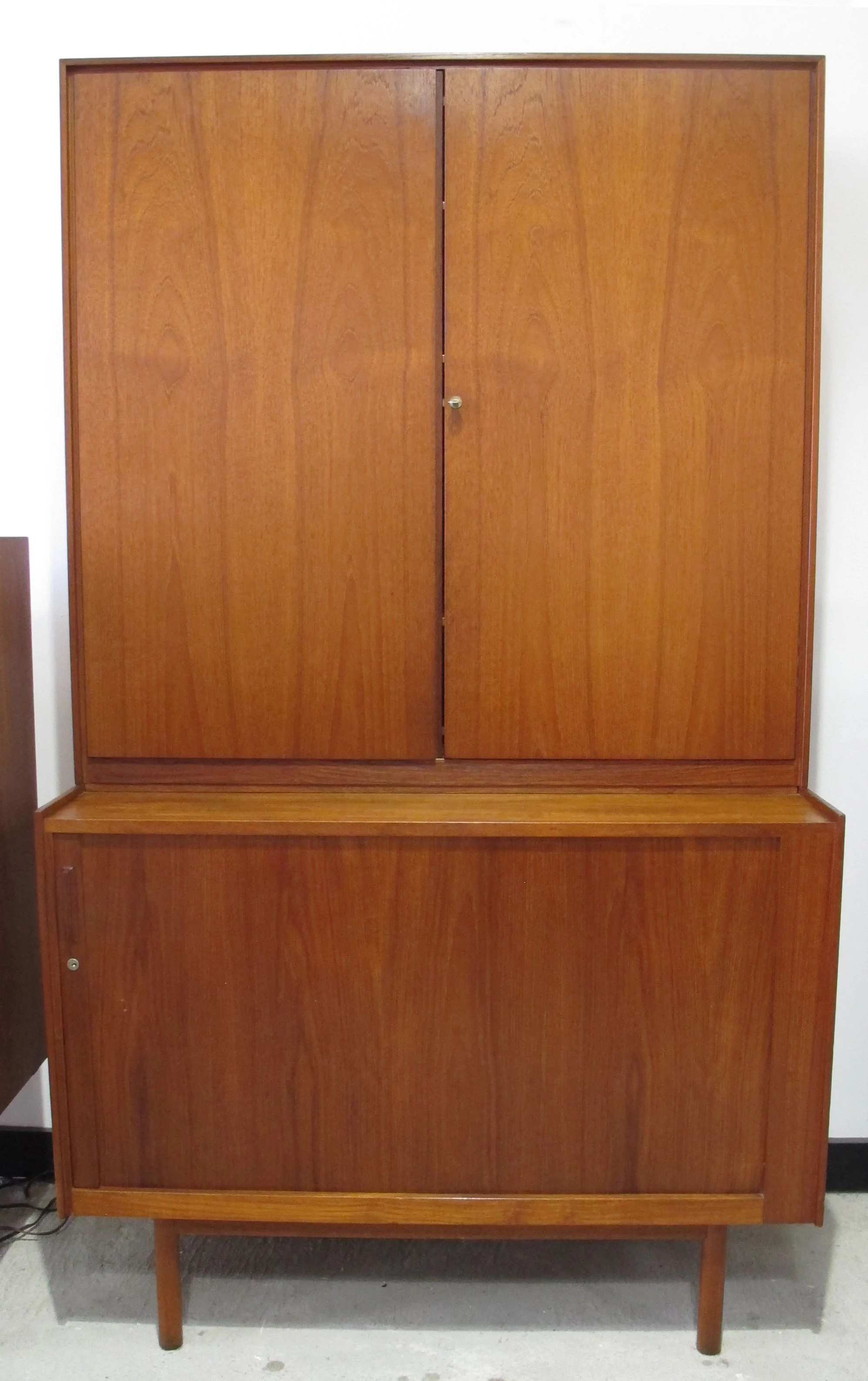TALL DANISH TEAK CABINET WITH TAMBOUR DOOR
