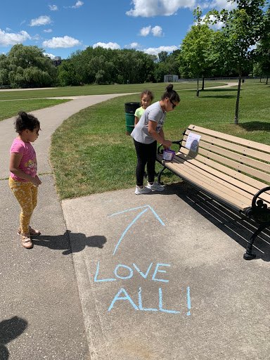 kid taking chalk- permission mom.jpeg