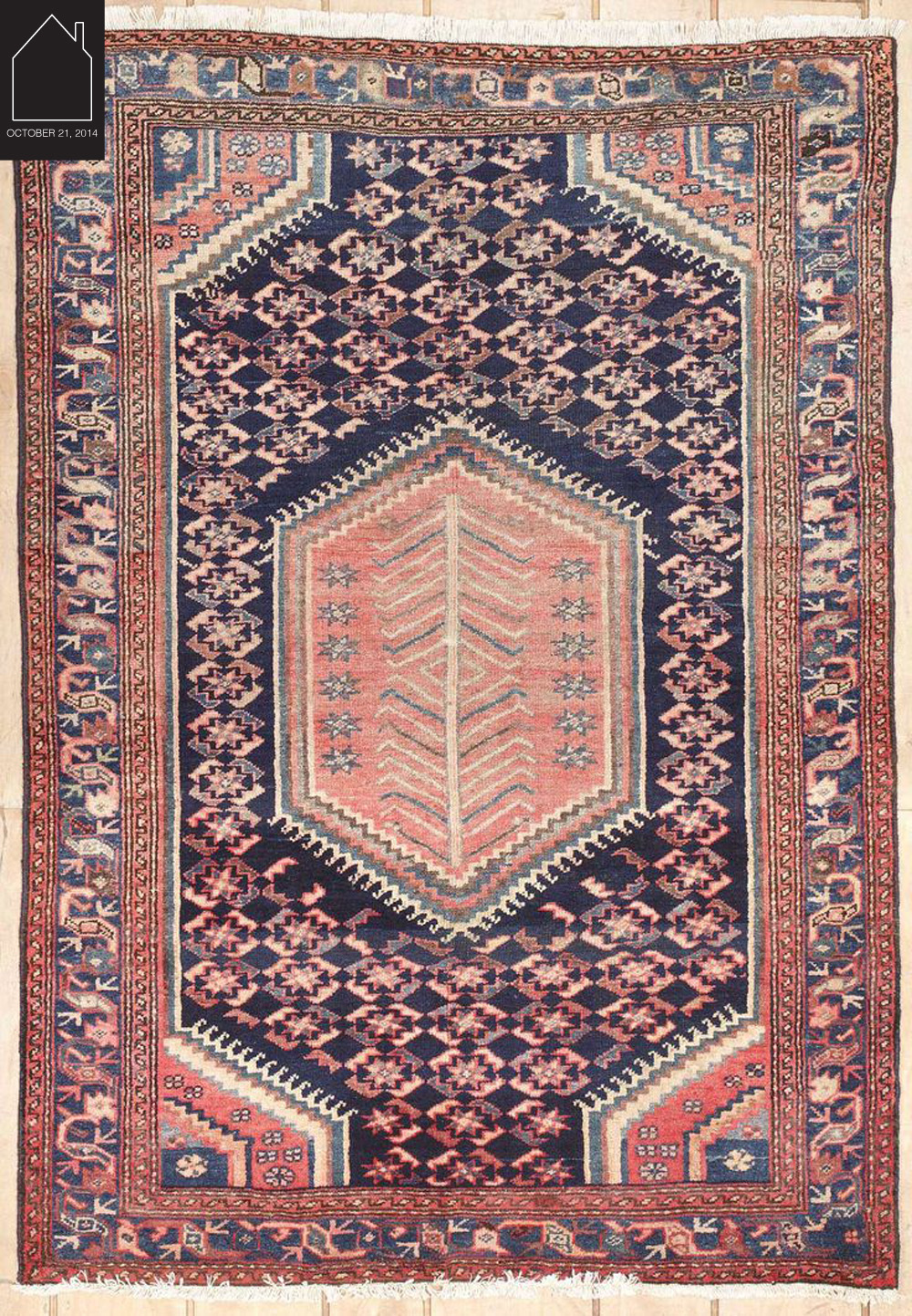 semi antique Persian rug via Medallion Rug