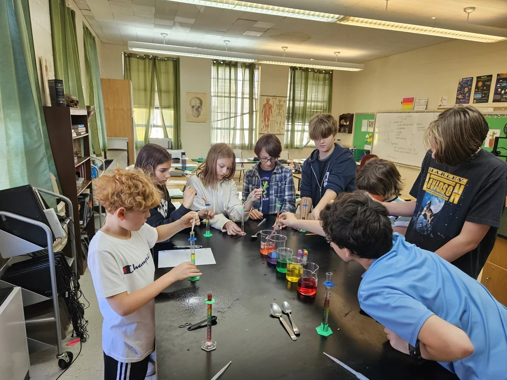 Students running an experiment at the lab bench