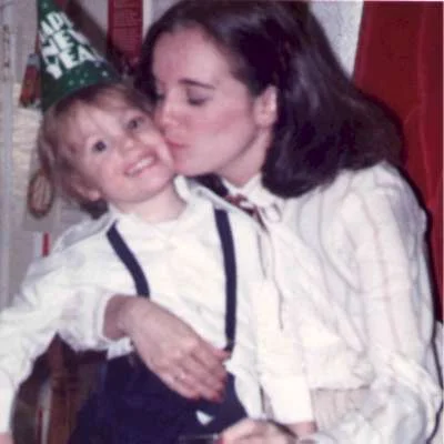 My mom kissing me when I was little.