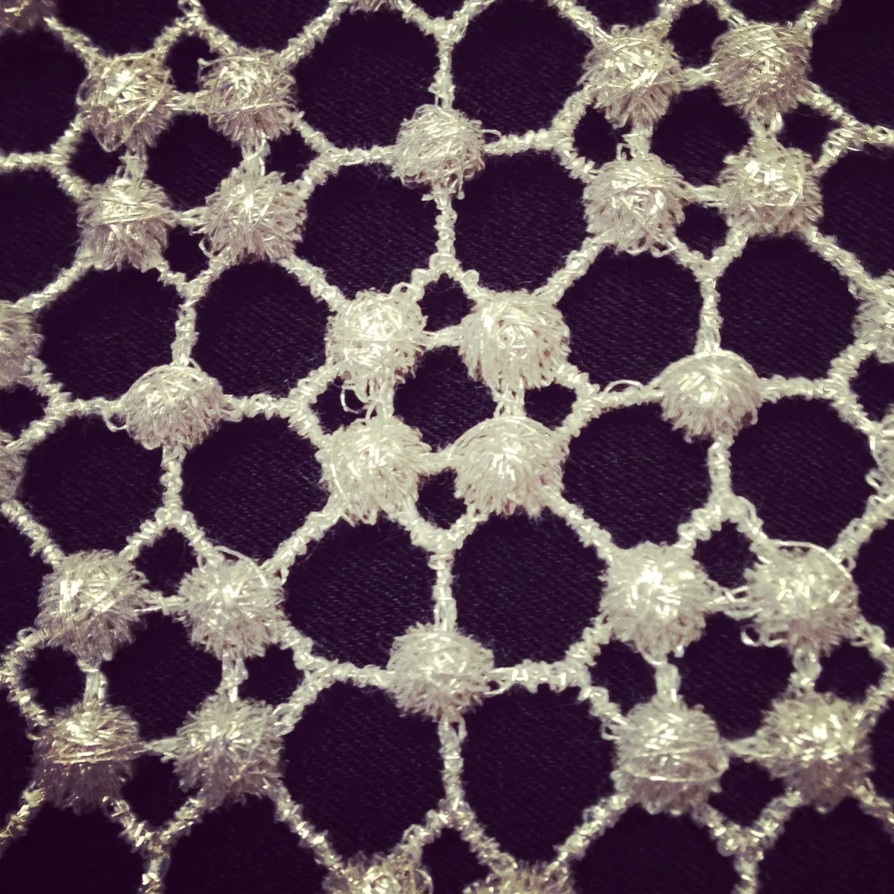 Image above: Our "pearl lace" from a heritage Italian mill. From our design archives.