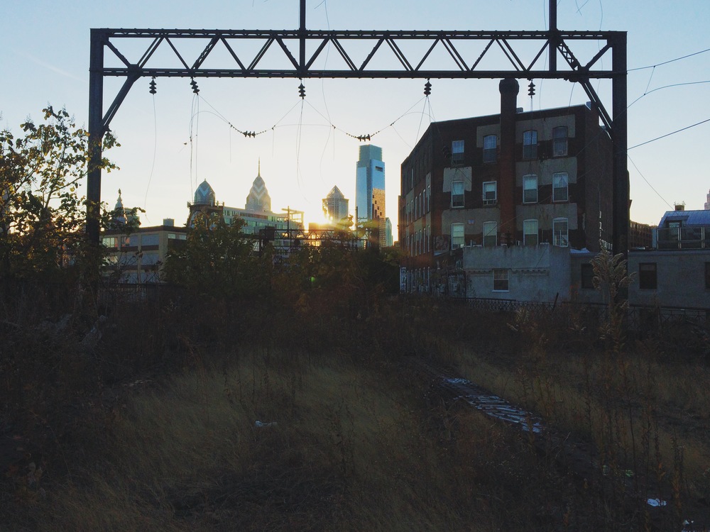 A photo of the Reading Viaduct overlooking Center City at sunset.