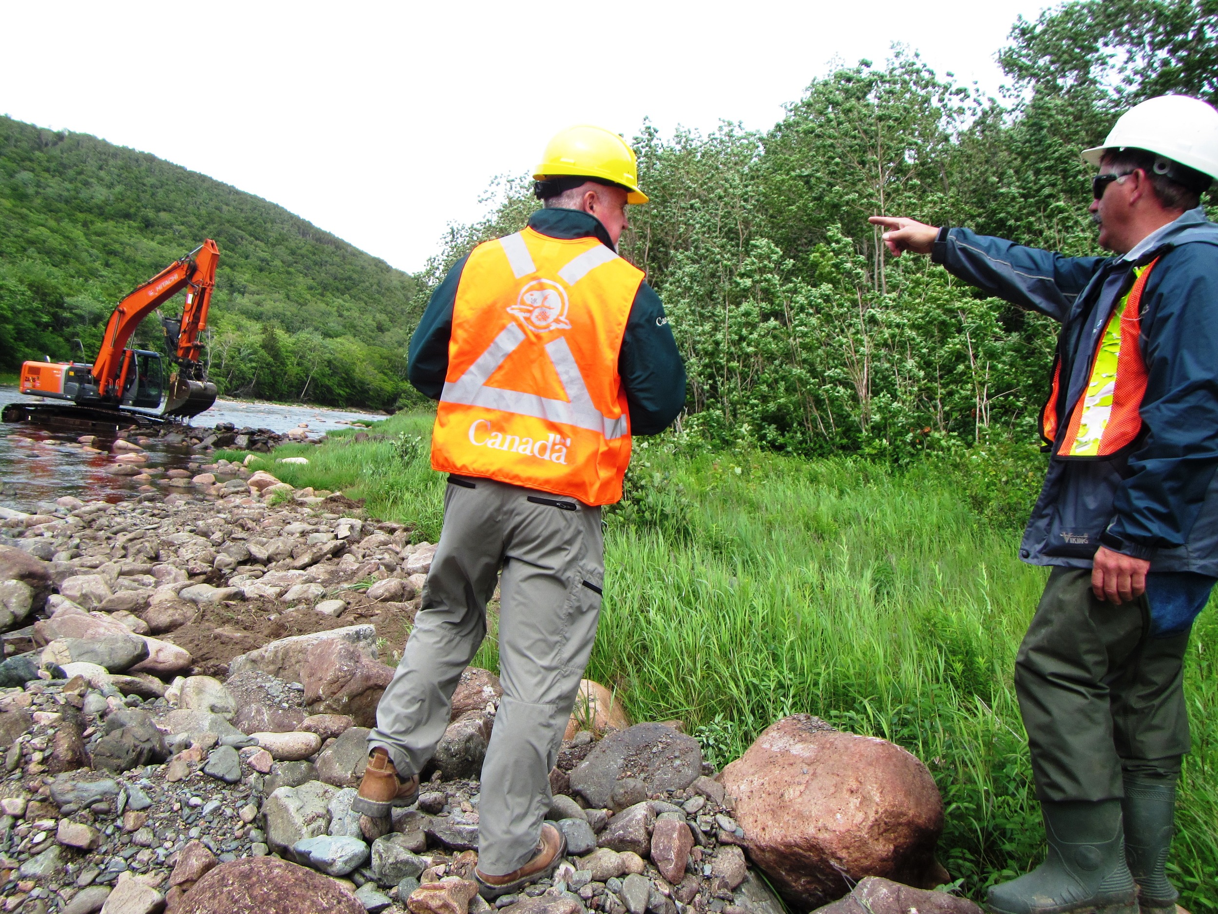 Project consultant points out locations for further instream structures