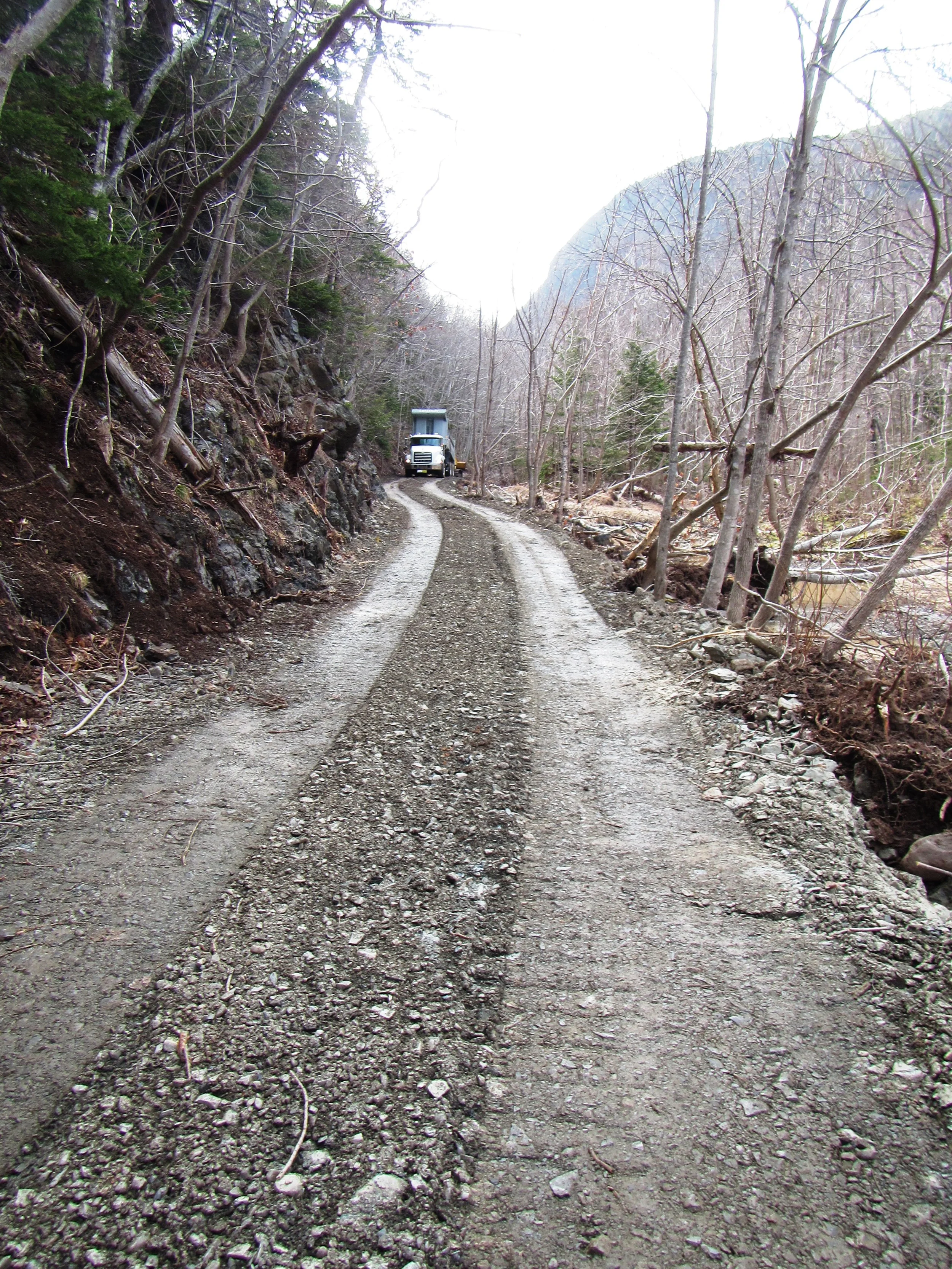 Truck unloading material on to help level and improve conditions on the Salmon Pools trail