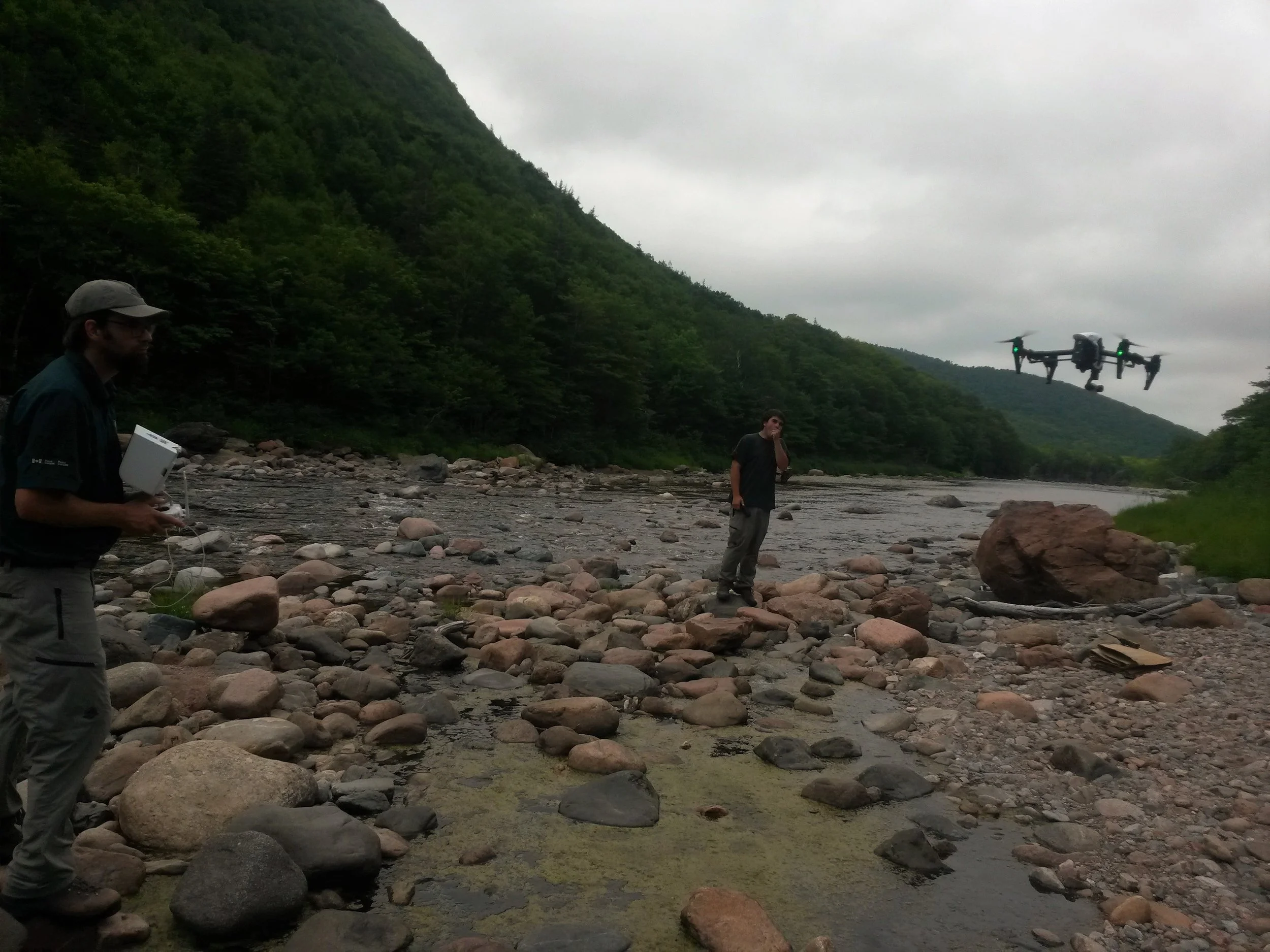 Parks Canada staff flying a drone last summer to help us to collect before and after photos and videos at our work sites on the lower Cheticamp River.