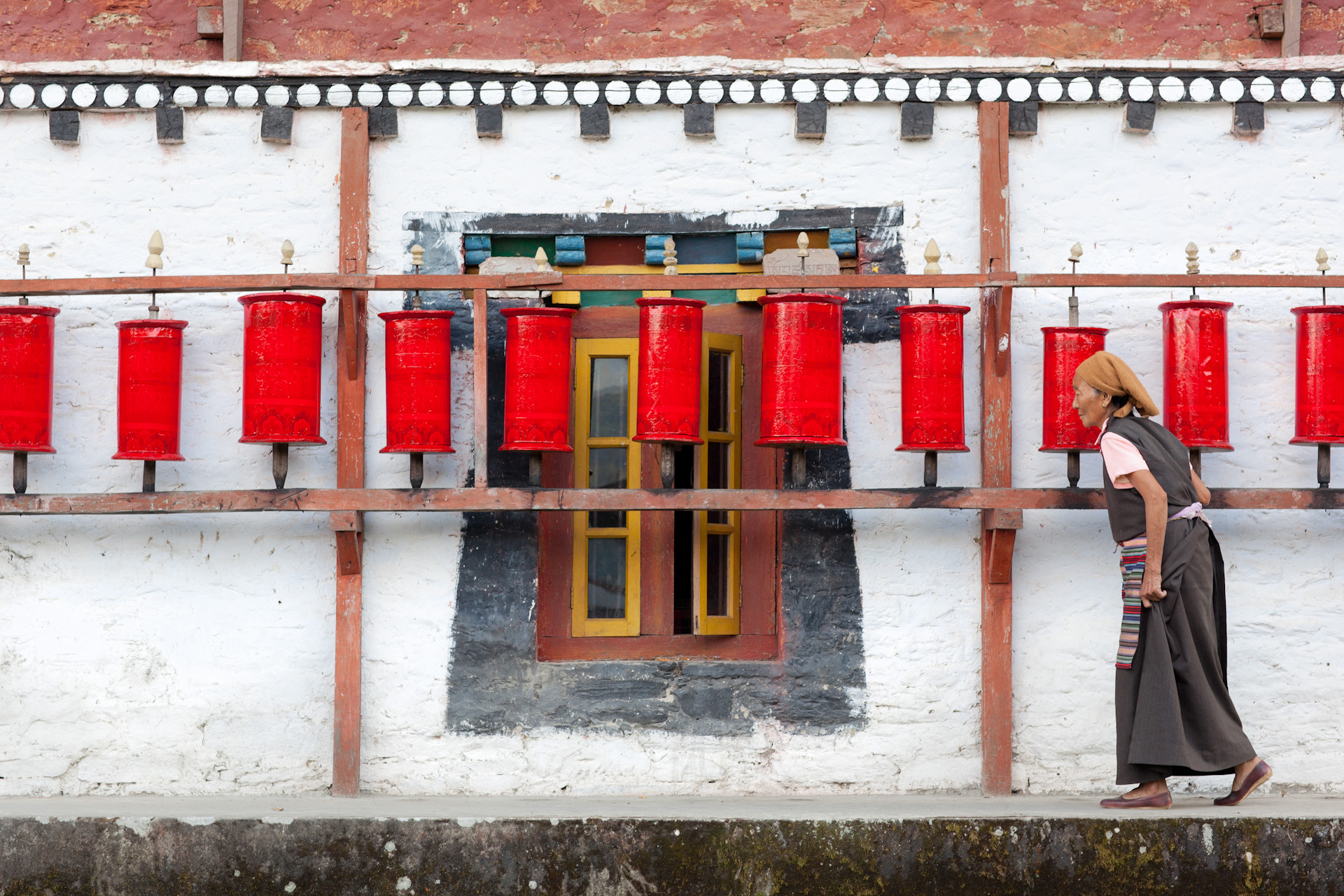 India-Sikkim-Travel-Tashiding-Monastery-Prayer-Wheels-Woman-Jason-Bax.JPG