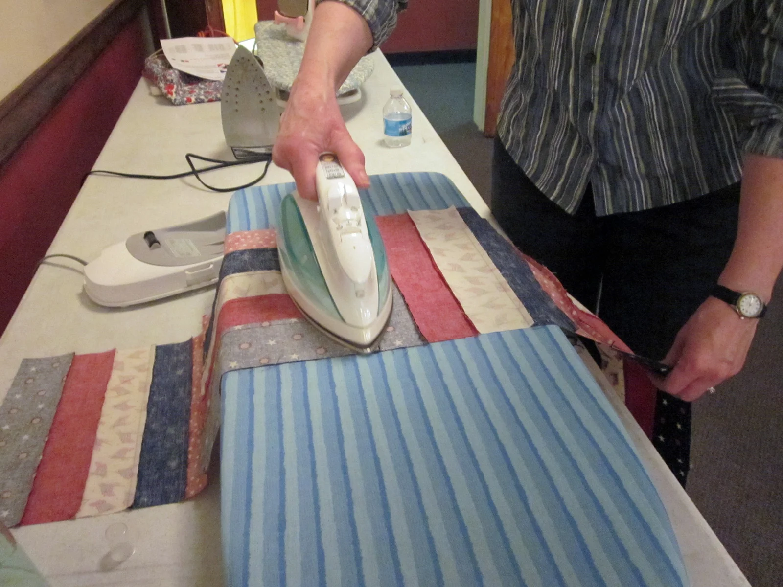 That's "IRON QUILTER", not ironing quilter!