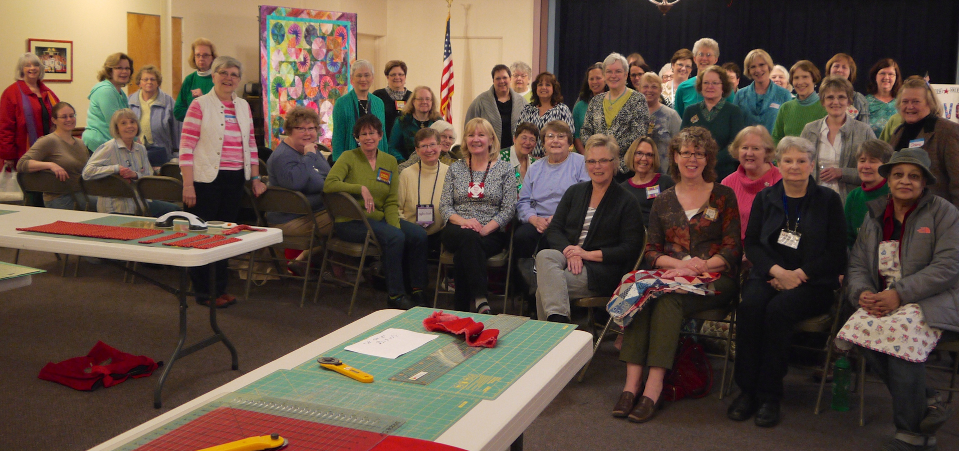 March Madness 2015; the guild is ready to work at the first special Quilts of Valor meeting. A fun time was had by all!